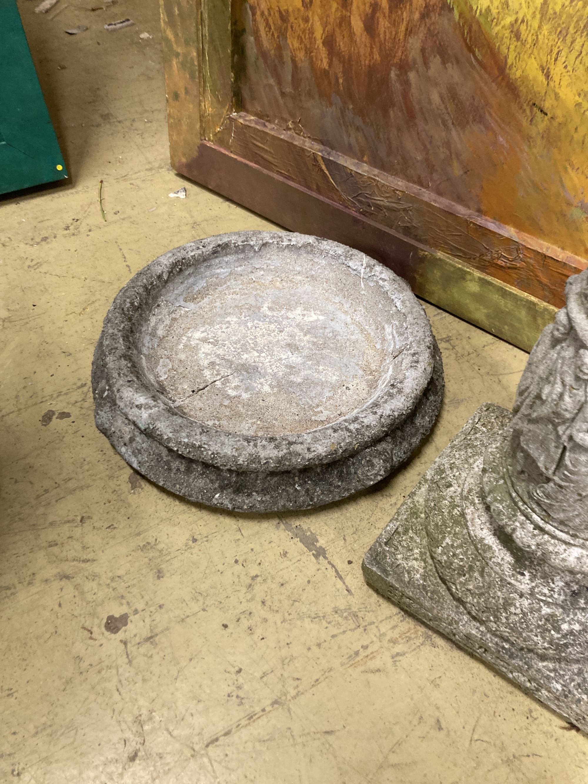 A reconstituted stone garden bird bath, 40cm diameter, height 78cm, a planter and a plinth